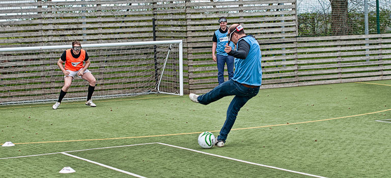 A man attempting to score a goal in Goggle Football