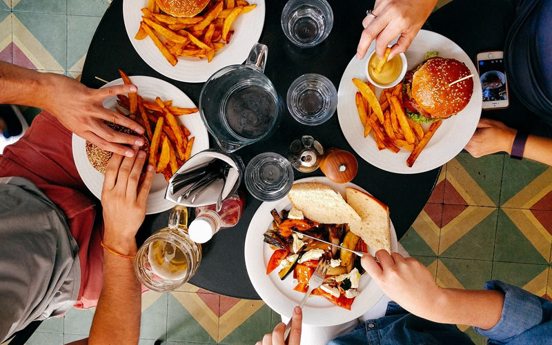 An aerial shot of four people having food