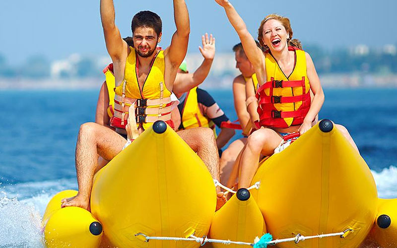 A group of people on a banana boat