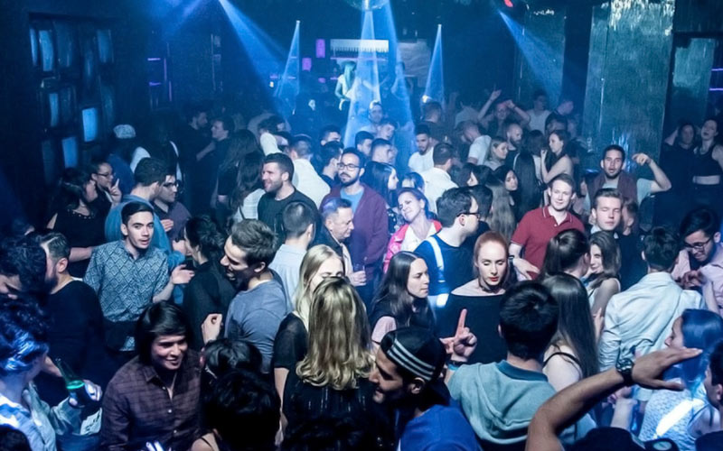 Some people in a crowded club