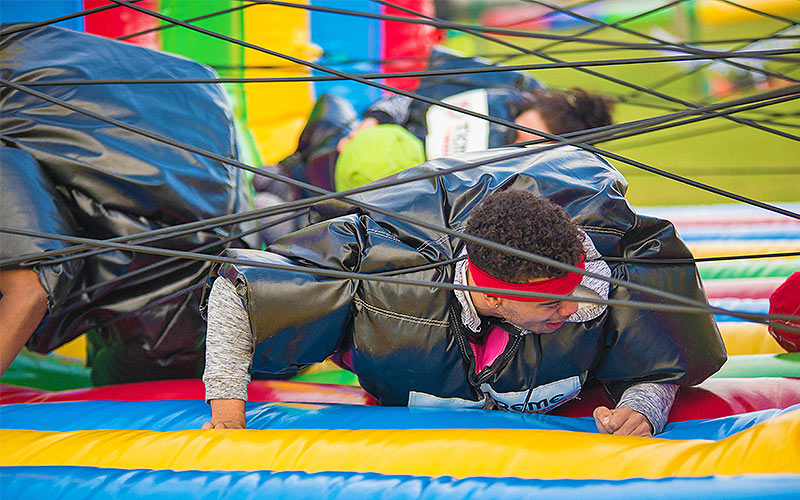 A man taking part in an obstacle course in Bournemouth