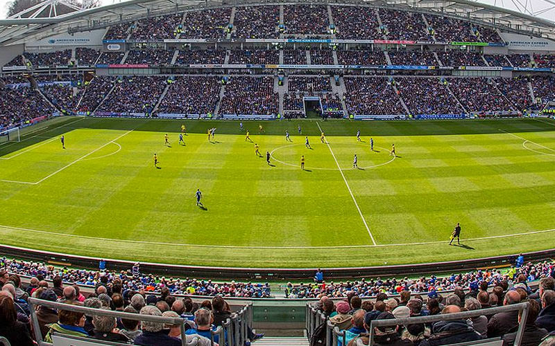 The view over a football pitch of a football game