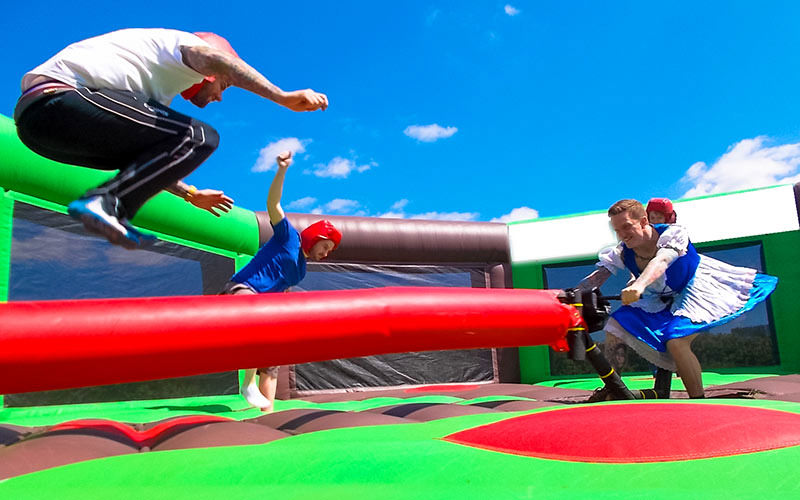 Some men playing on the West Country Games bike in Bristol
