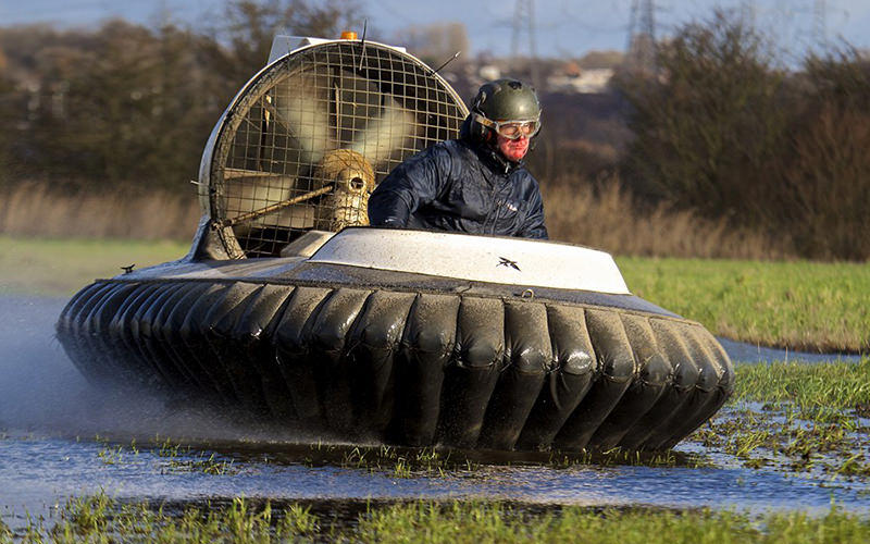 A man on a racing hovercraft