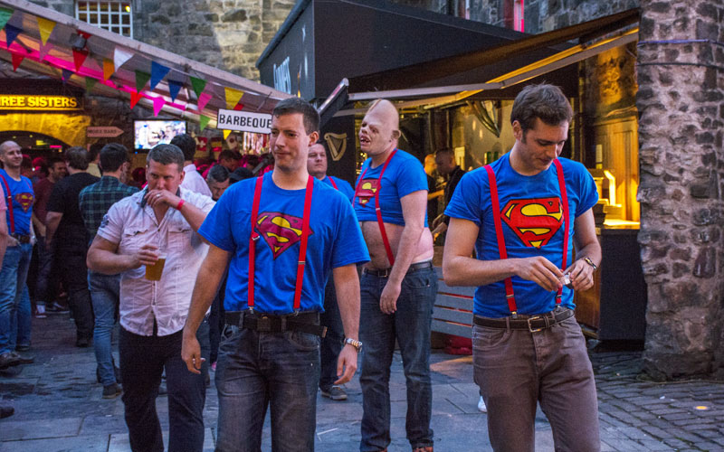 Some men wearing superman T-shirts in Edinburgh