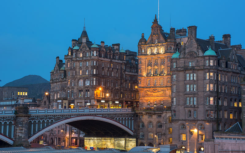 A grand hotel in Edinburgh at dusk