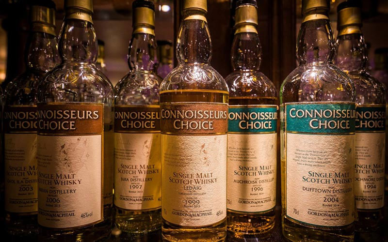 Some Scotch whisky in bottles