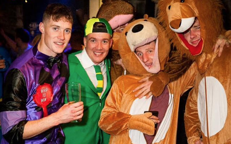 Five men in fancy dress, in a club in Galway