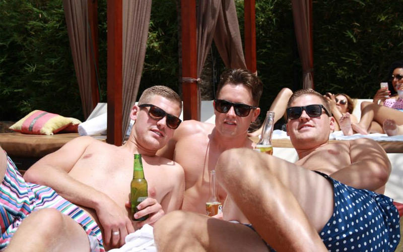 Some men at a beach bar in Marbella