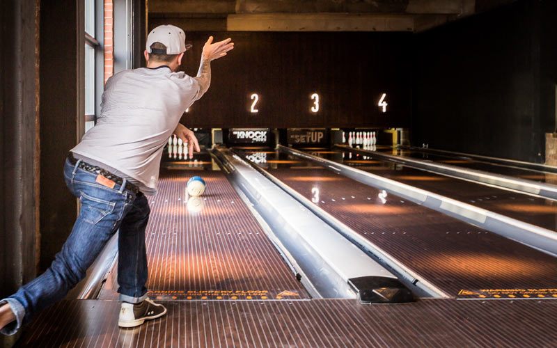 A man bowling in Lane7