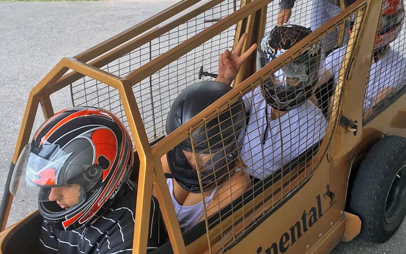  A group of people in a bobsleigh