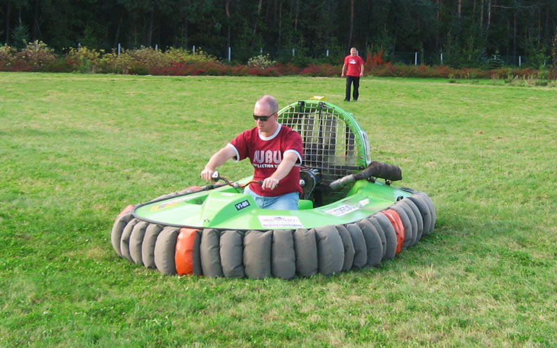 A man riding an inflatable vehicle