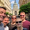 Five people in front of Hungarian Parliament Building