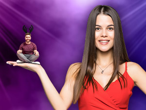 Woman holding a man who's sitting cross legged with stag antlers on