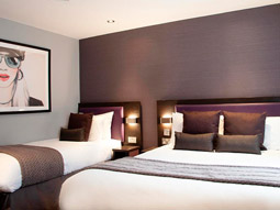A room with a double and a single bed at Epic Apart Hotel - Duke Street 