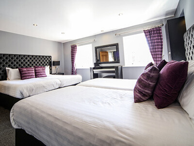 A bedroom at Double Top Apartments by Epic