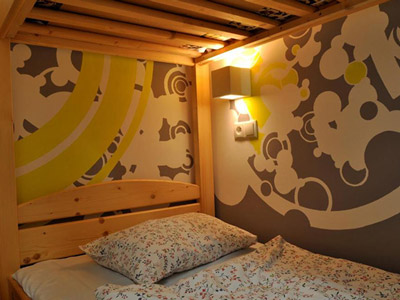 A bunkbed in a room at Greg and Tom Party Hostel in Krakow