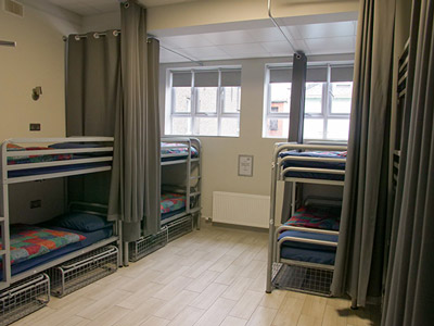 A set of three bunkbeds in a communal room at Abbey Court Hostel in Dublin