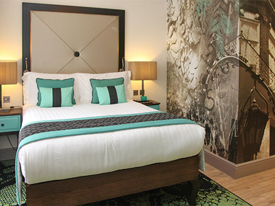 A double bed in a room at Hotel Indigo Kensington