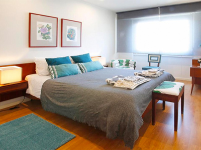 A double bed room at Anjos 44 Lisbon Apartments