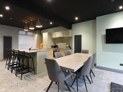 Kitchen, breakfast bar and dining table 