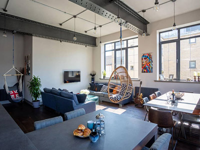 Spacious living room and dining area of Loft Apartment 