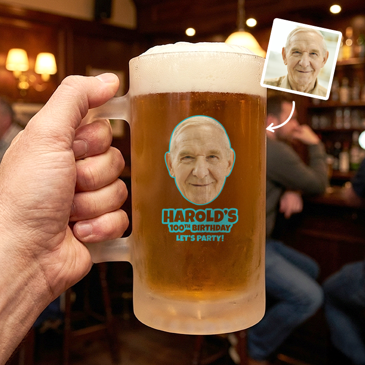 A custom Kronenbourg-inspired birthday stein with frosted glass that reads Joseph 1664 with a pub background