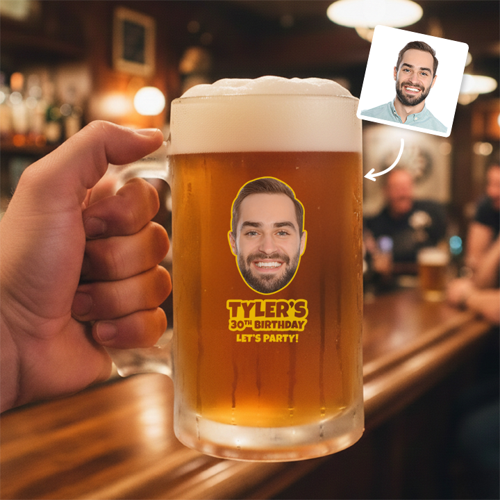 A custom Kronenbourg-inspired birthday stein with frosted glass that reads Billy 1987 with a pub background