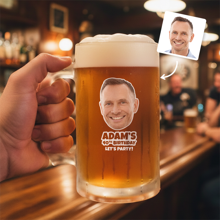 A custom Kronenbourg-inspired birthday stein with frosted glass that reads Joseph 1664 with a pub background