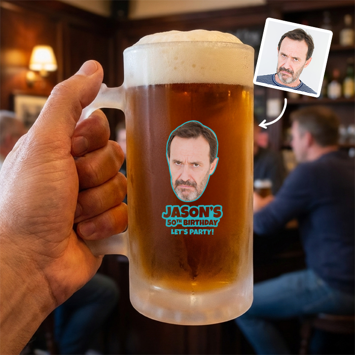 A custom Kronenbourg-inspired birthday stein with frosted glass that reads Joseph 1664 with a pub background