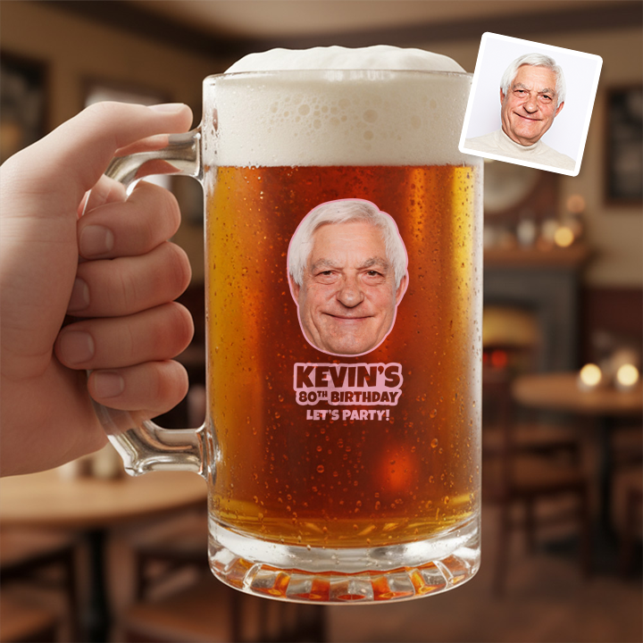 A custom Kronenbourg-inspired birthday stein with frosted glass that reads Joseph 1664 with a pub background