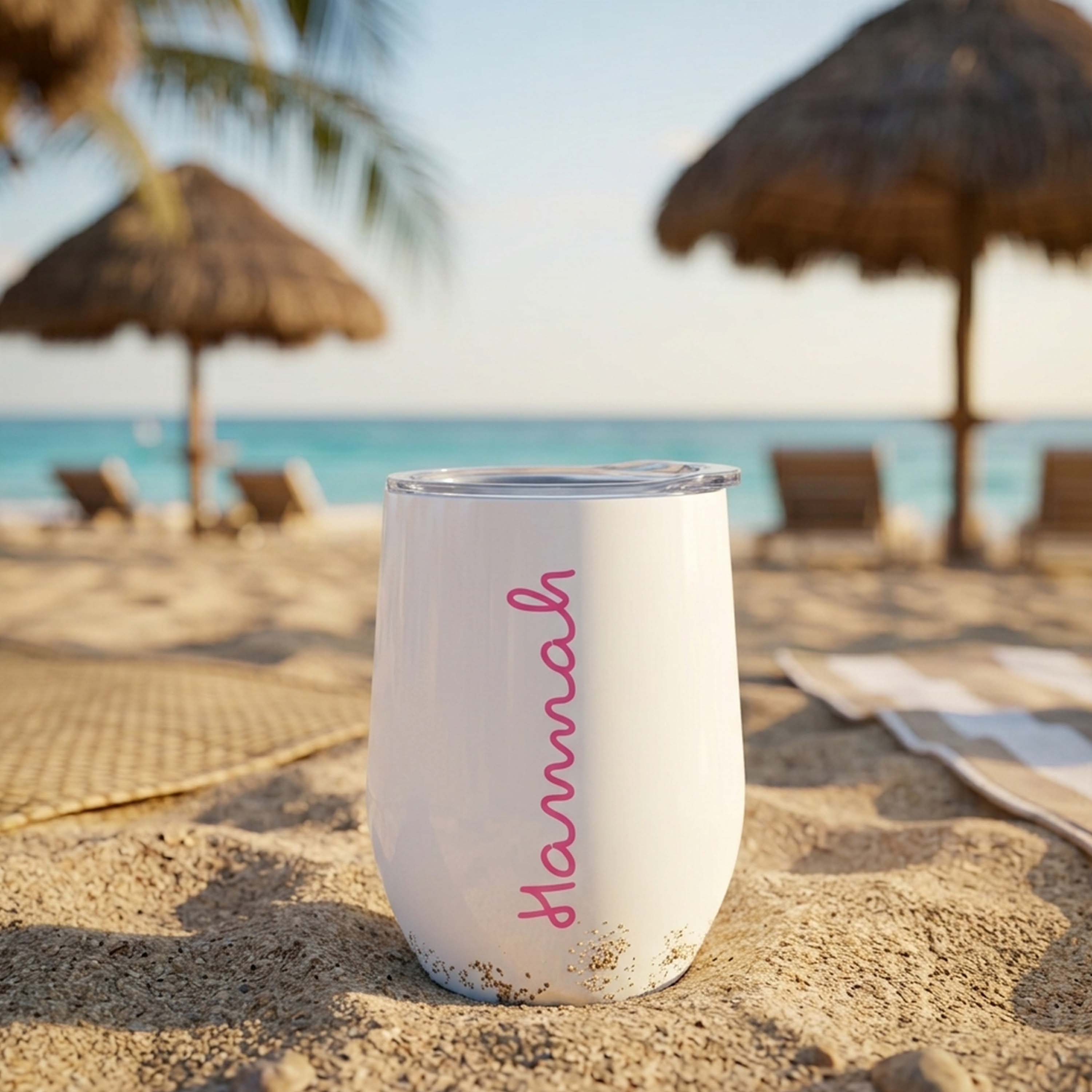 A Love Island inspired Like Island white waterbottle in a bowling bottle style with the custom text Emily printed on it in a curly pink font