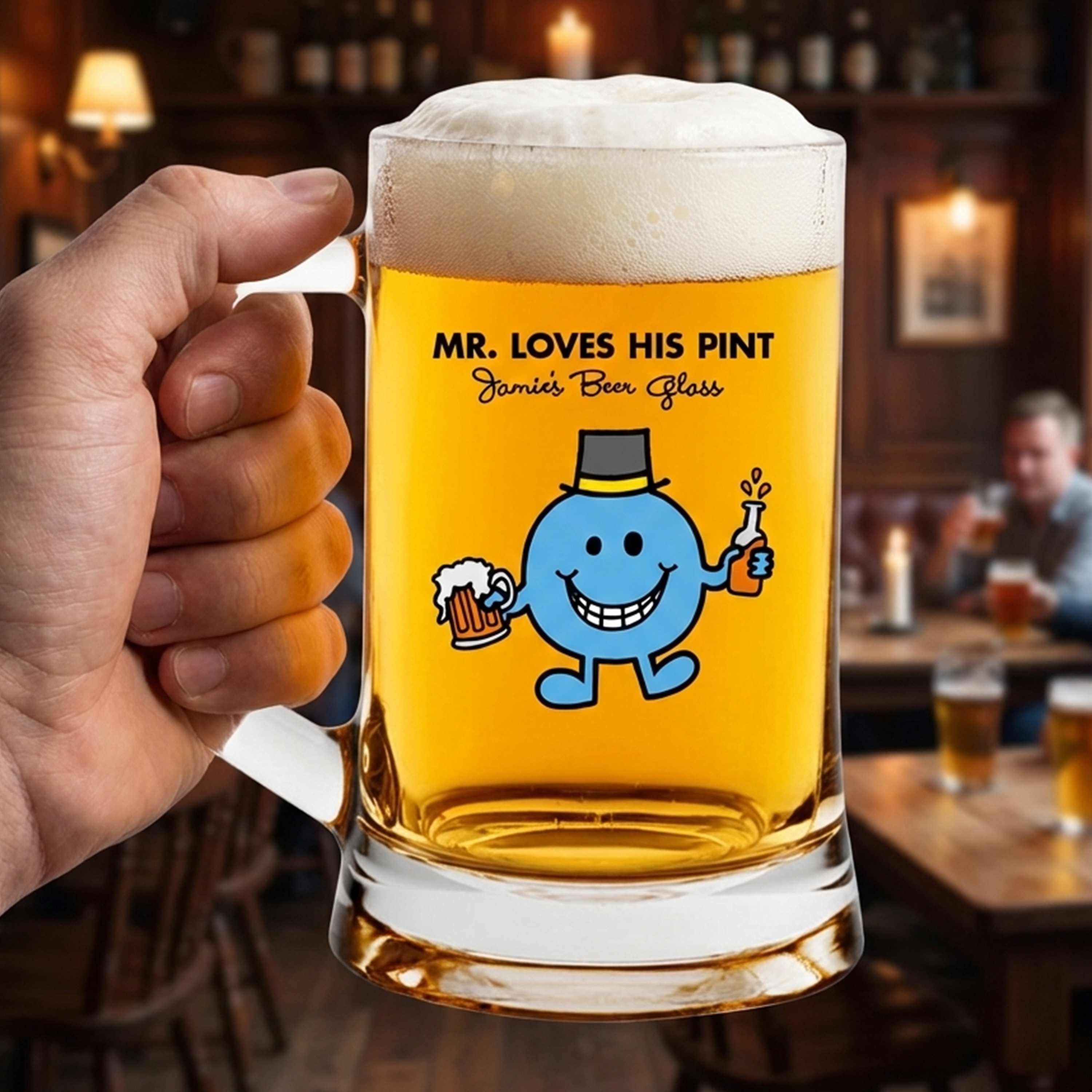 A custom Mr Man themed stein that has been personalised with the custom text Mr Loves His Pint Jamie's Beer Glass with a pub background