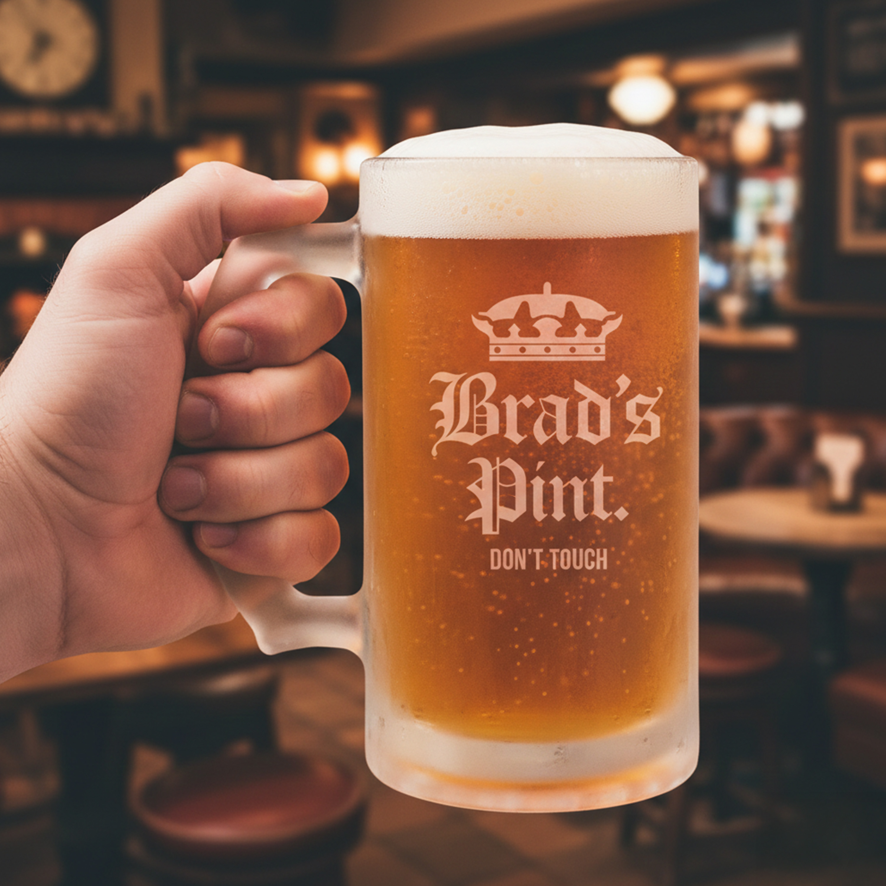 A custom Corona-themed stein that has been personalised with the custom text Brad's Pint Don't Touch with a pub background