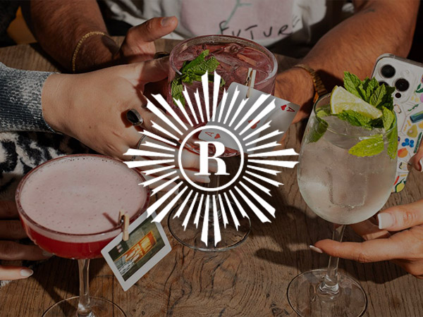 Lit up vodka sign above the bar at Revolution 