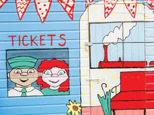 The 'ticket booth' painted shed in the garden of t