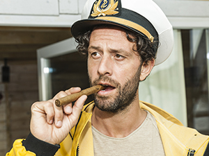 man taped to lamppost