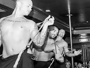 Three strippers pulling their braces at Adonis Cab