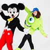 Two of the team from Last Night of Freedom posing whilst dressed up as Mickey Mouse and Mike Wazowski