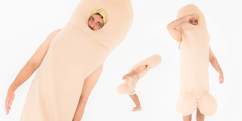 A close up of a male model wearing a penis costume and posing