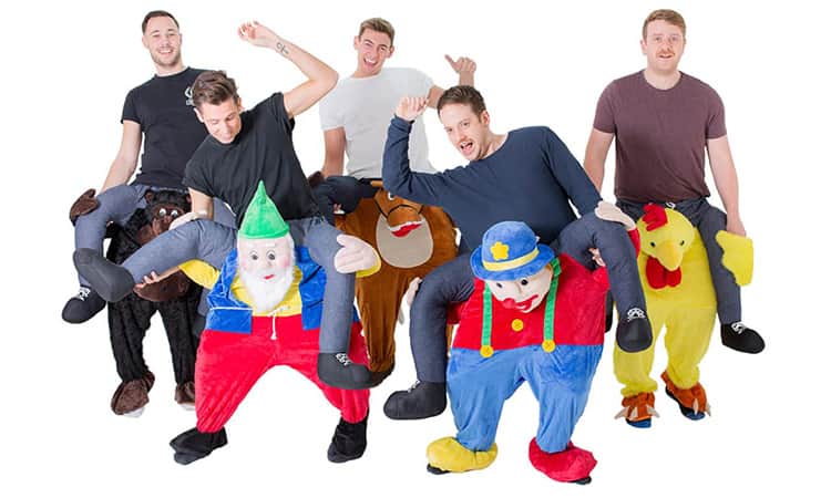 A group of men in Carry Me costumes