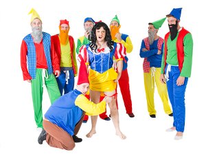 A man dressed as Snow White with seven gnomes