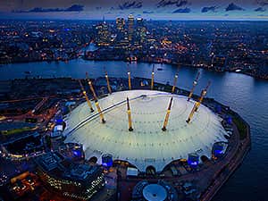 The 02 arena at dusk, with the Thames in the background