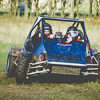 Two people in a blue rage buggy