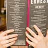 Last Night of Freedom staff looking at the menu at Ernest in Newcastle upon Tyne