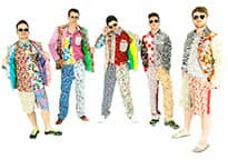 five men trying to look cool in clashing patterned outfits