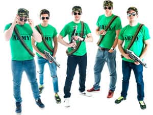 Five men in army t-shirts and bullet belts, holding inflatable guns