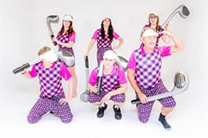 Golfers try and create a serious look for the camera in their outfits