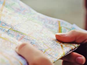 Hands holding a map