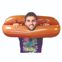 Man with head and hands through the inflatable stocks on a white background